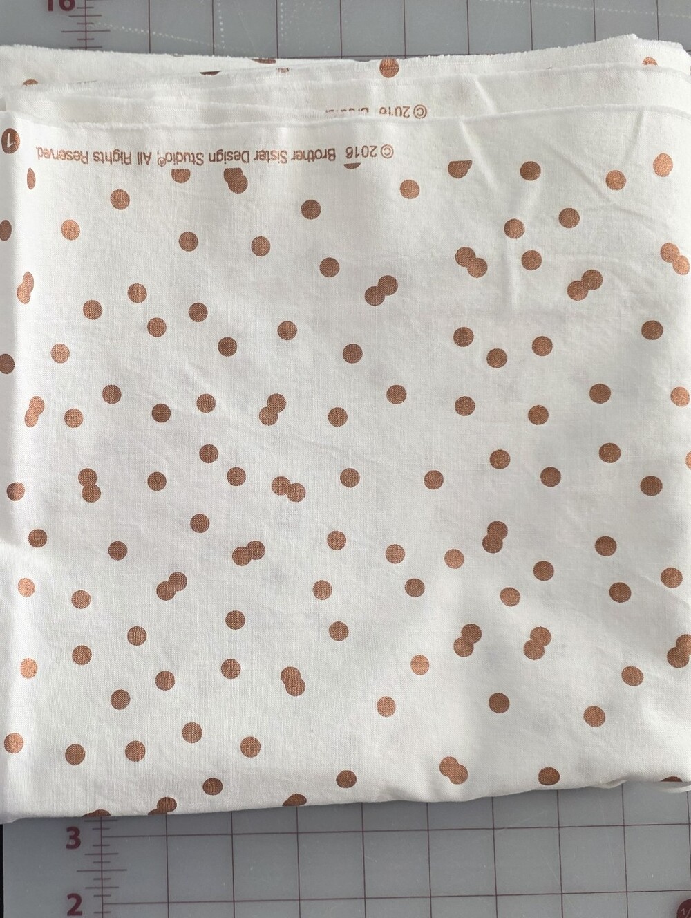 Ivory With Rose Gold Dots Quilting Cotton